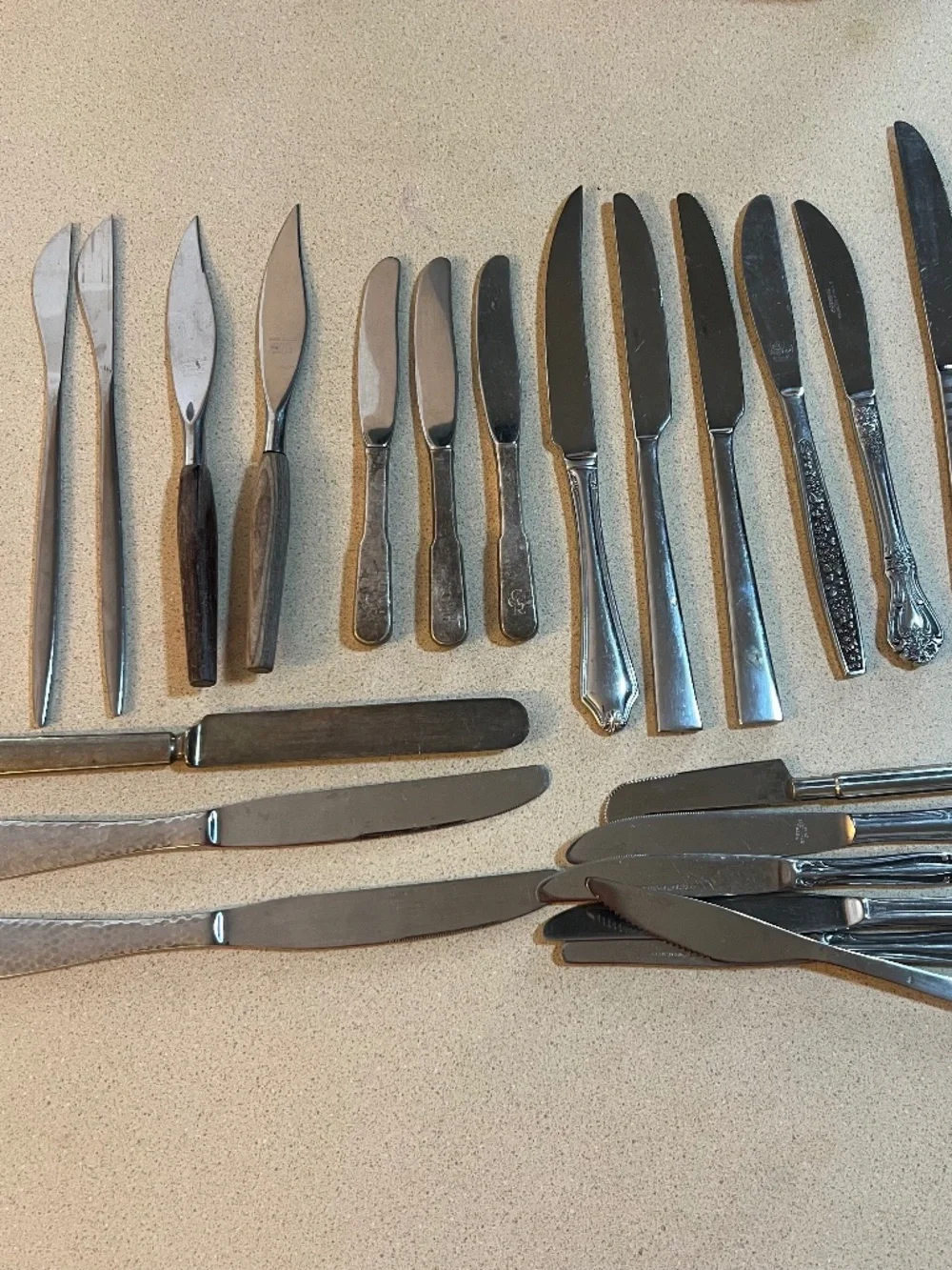 Lot of dinner knives (Oneida, Regal, Roger’s and more)